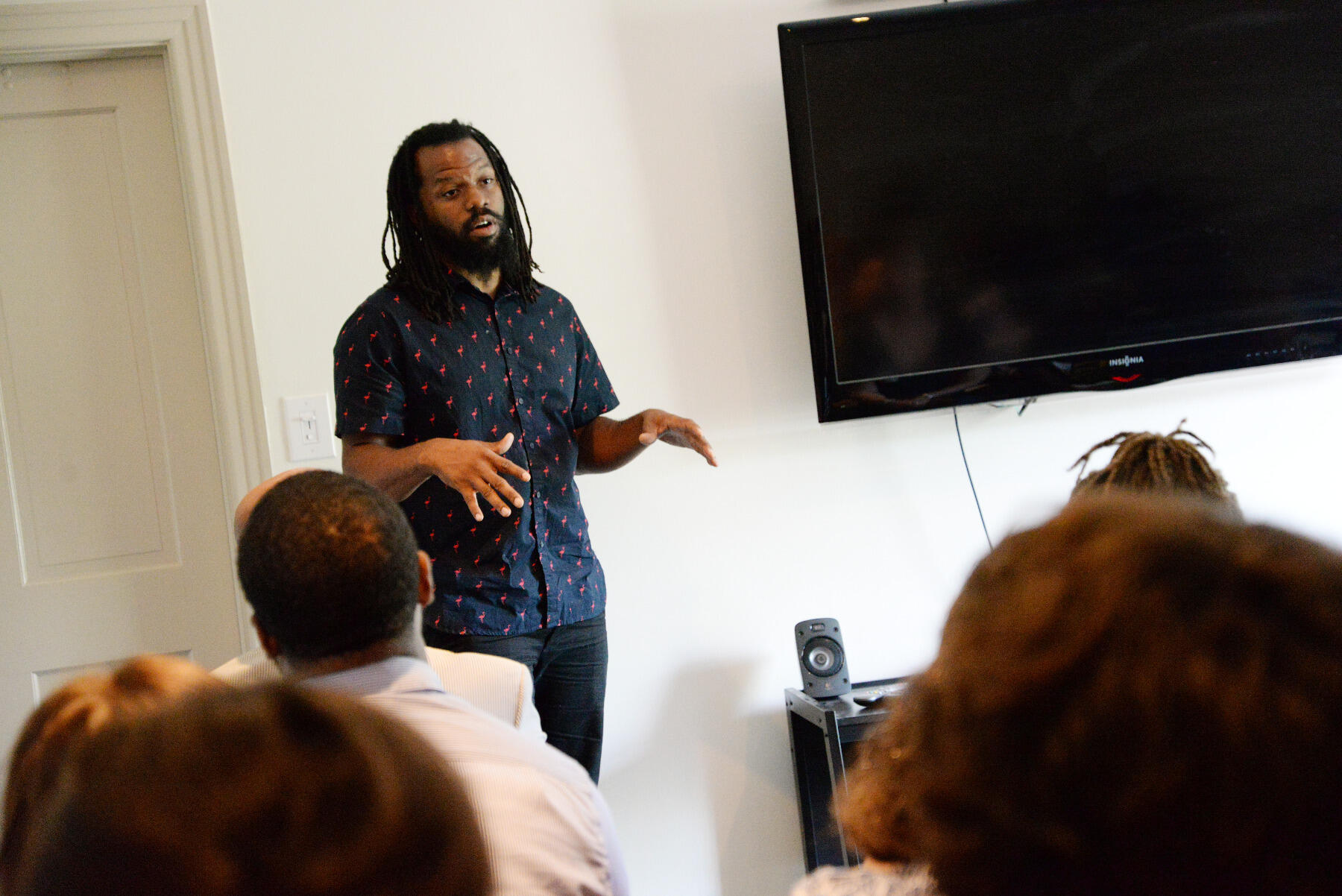 Duron Chavis, community engagement coordinator for Lewis Ginter Botanical Garden and a community advocate and activist, talked to the students about food security and how Jackson Ward was affected by redlining, segregation, white flight and the construction of Interstate 95.
