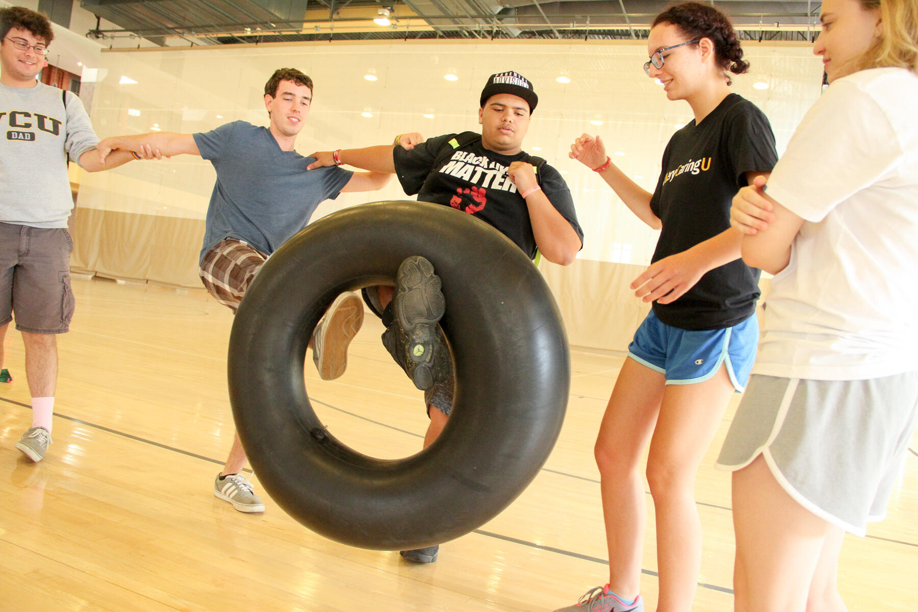Incoming freshmen participate in team-building activities at Cary Street Gym during RAM CAMP. 