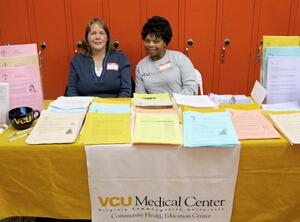 Community Health Education Center volunteers spread the word about the organization’s services. 