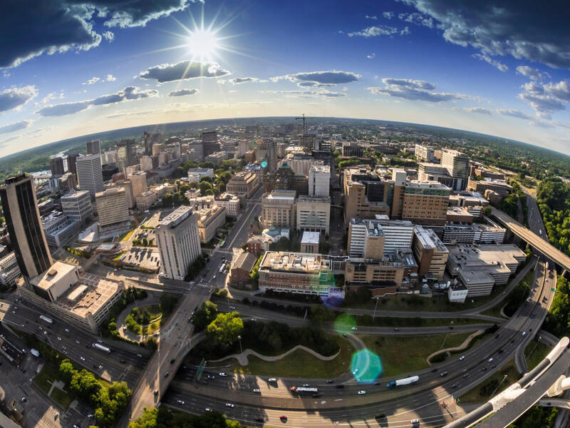 An aerial image of a city skyline, including VCU Health's campus and its surroundings in downtown Richmond.