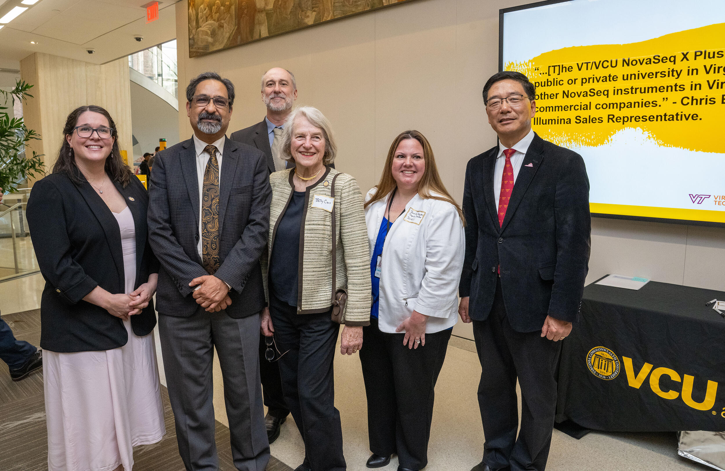 A group photo of six people. 