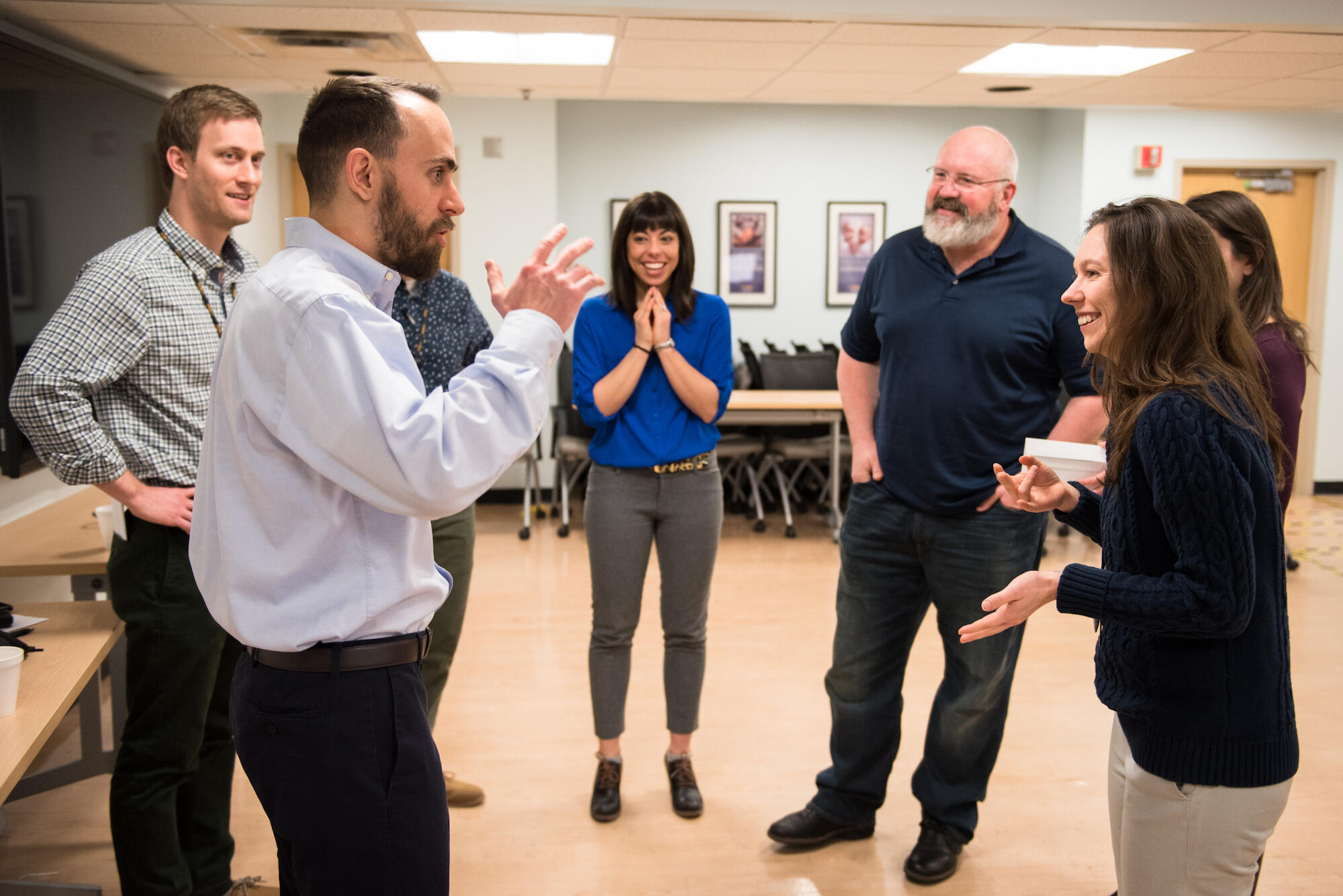 group of people standing in a circle