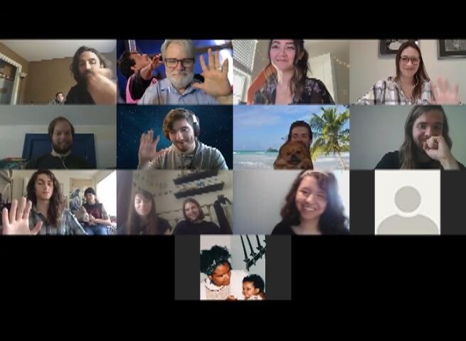 Students and faculty members participate in a videoconference session.