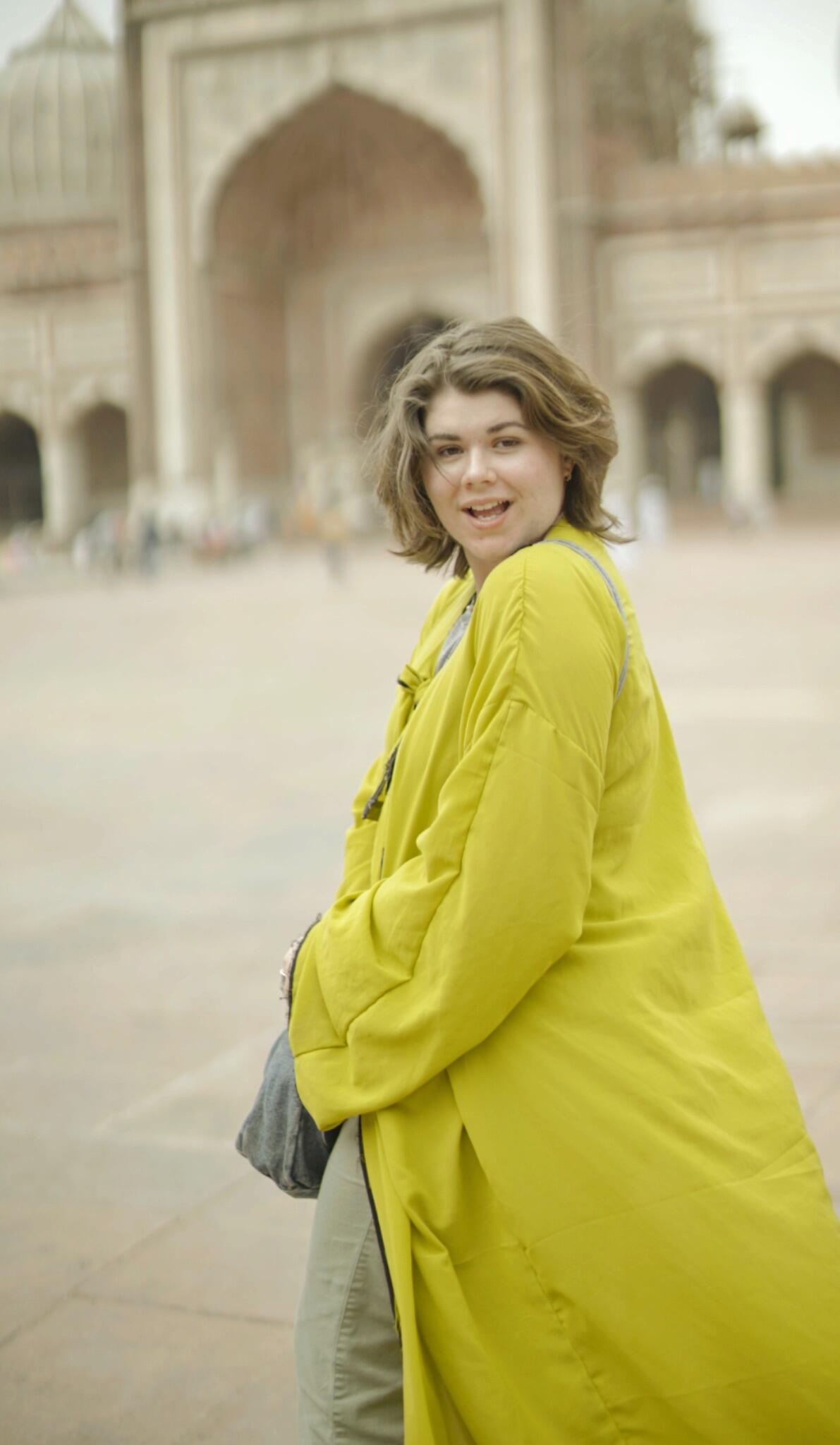 Hannah Sahr standing in front of Jama Masjid, one of the oldest mosques in India, located in Old Delhi.