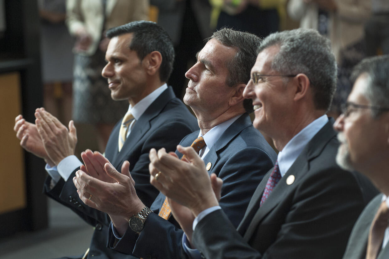 From left, VCU President Michael Rao, Ph.D.; Gov. Ralph Northam; and Daniel Carey, secretary of health and human resources, at Monday's announcement. (Kevin Morley, University Relations)