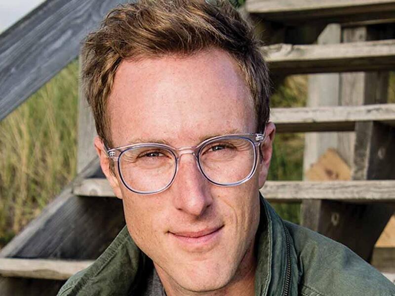 Photo of Daryl Tongeren sitting on stairs