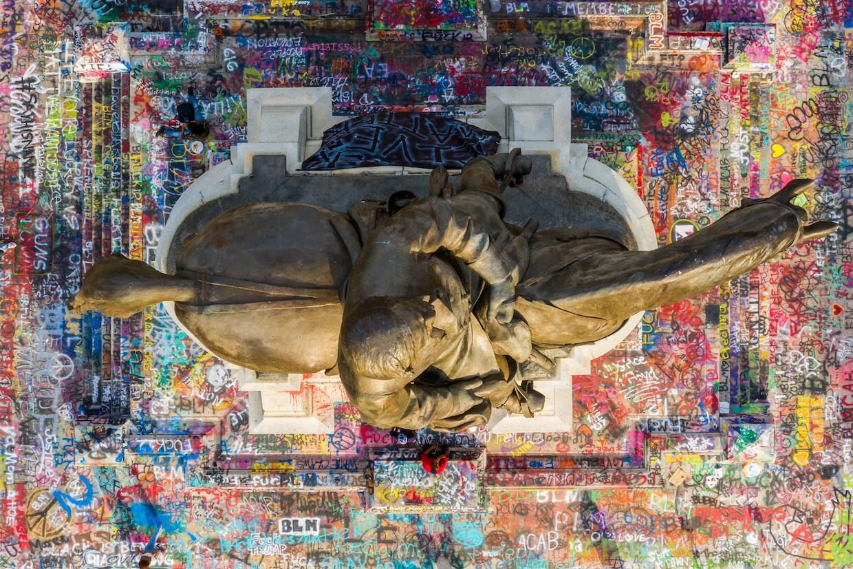 birds-eye view overtop the Robert E. Lee monument in Richmond. The monument is covered in graffiti