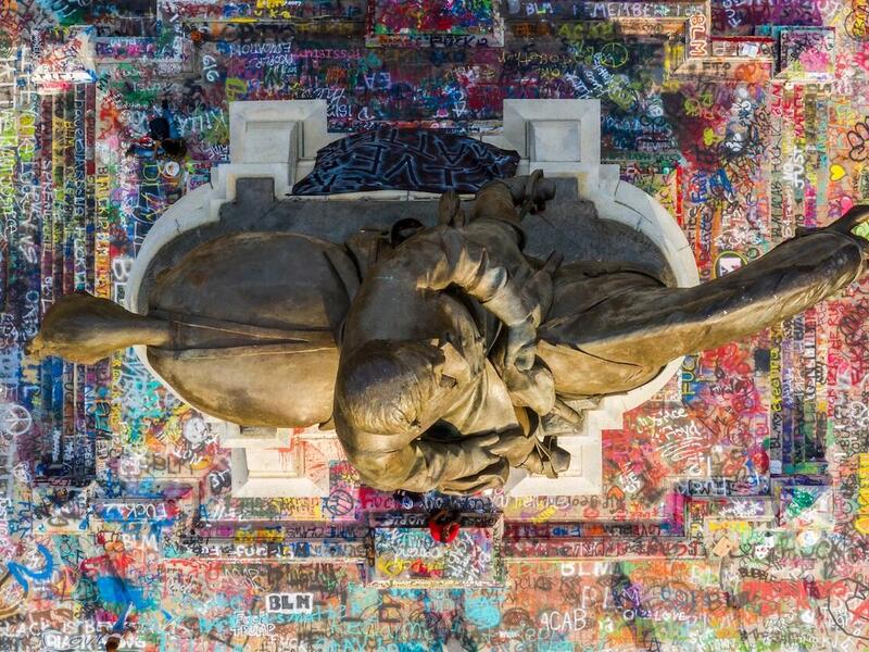 birds-eye view overtop the Robert E. Lee monument in Richmond. The monument is covered in graffiti