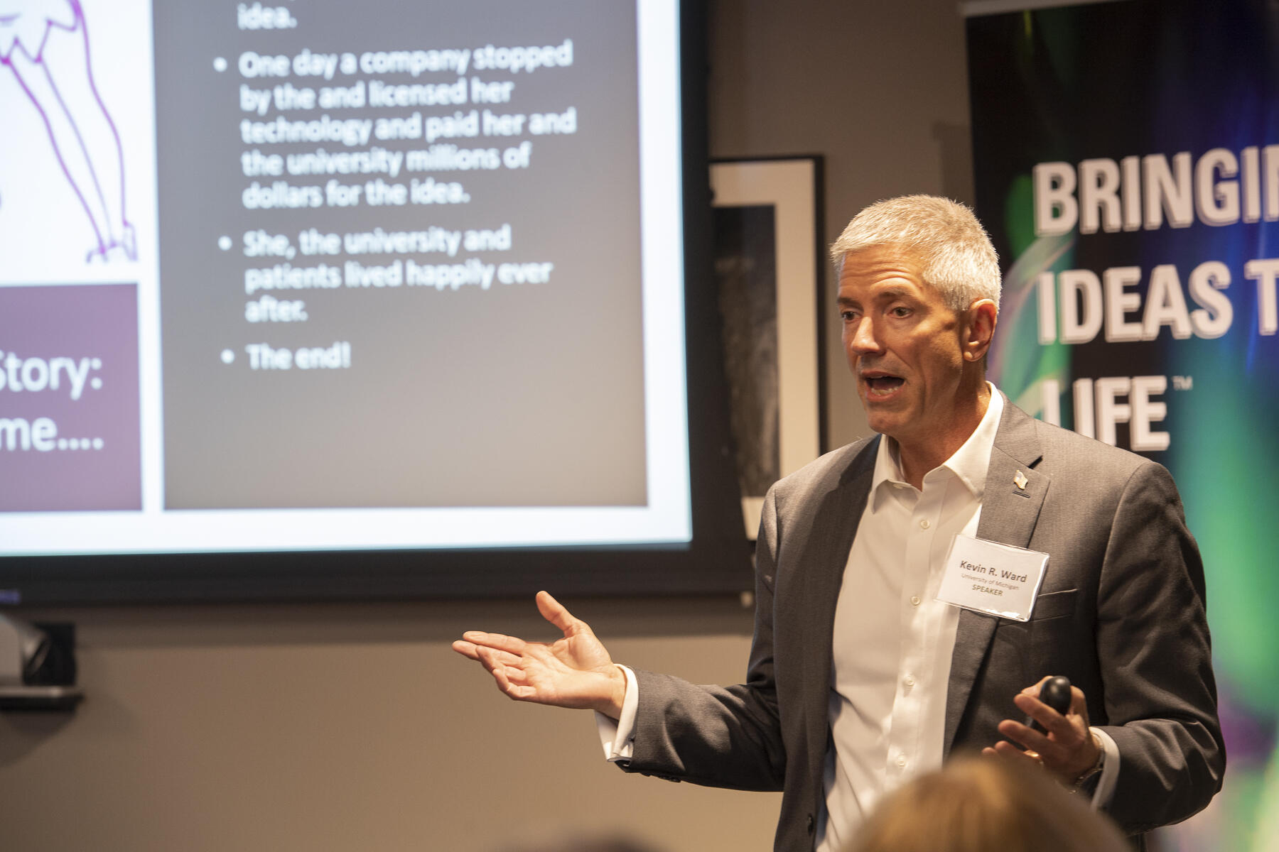 Kevin Ward speaking to an audience.