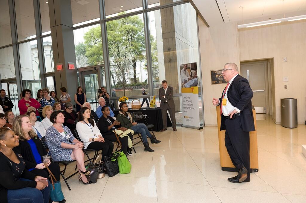 Transplant recipients, living donors and donor families attended the flag-raising event at the VCU McGlothlin Medical Education Center on Friday morning. Transplant community professionals from UNOS, Donate Life America and LifeNet Health were in attendance as well. Photo by Tom Kojcsich, University Marketing.