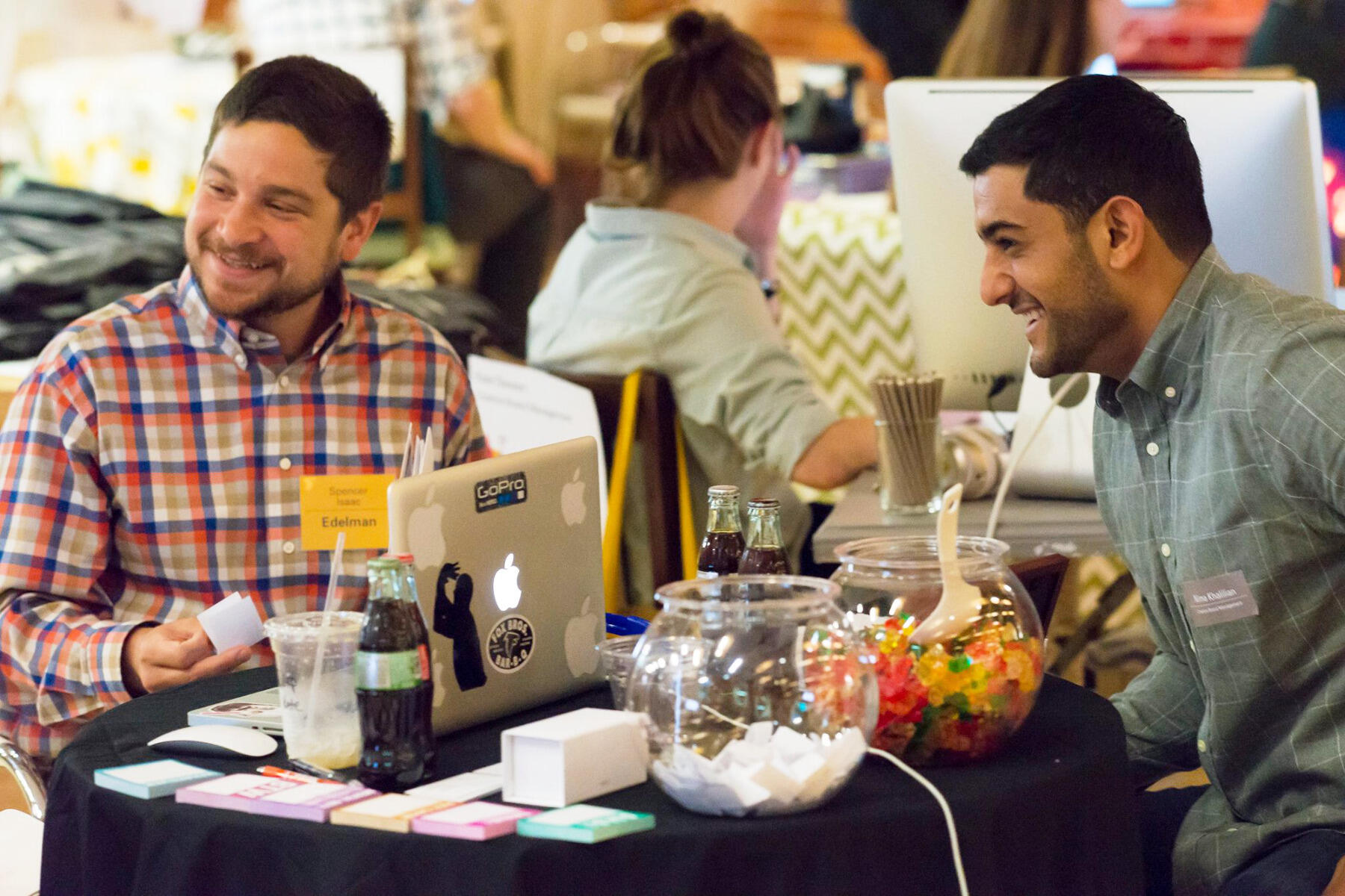 Nima Khalilian (right), a VCU Brandcenter student, speaks with a recruiter at the reverse career fair.
