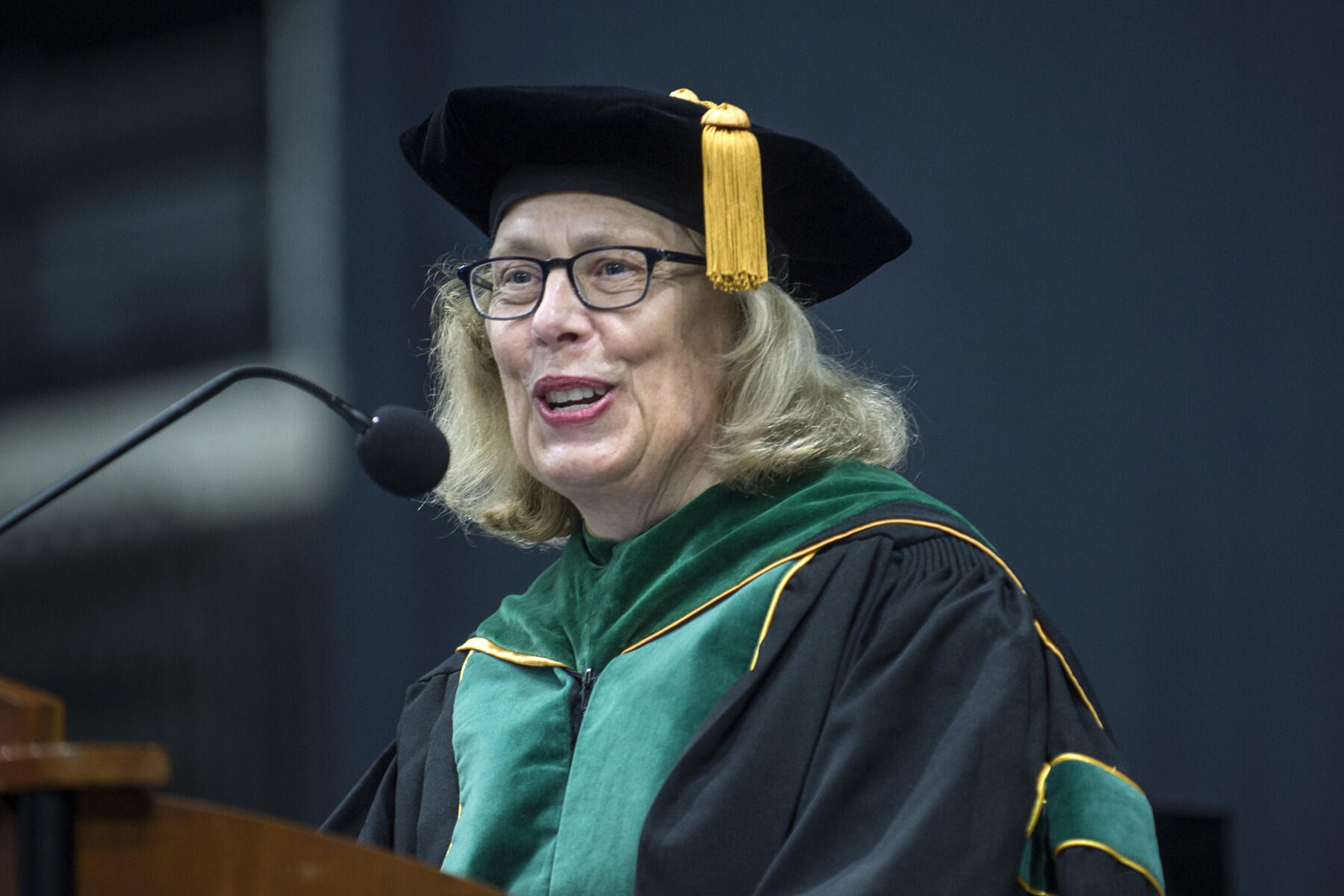 Claire Pomeroy, M.D., is an advocate for patients and public health. At the VCU School of Medicine Hooding Ceremony on May 11, she encouraged the audience of graduating medical students to apply their education toward serving humanity. "Use your knowledge to benefit others," Pomeroy said. "Put patients’ needs above your own and embrace the value of altruism." (Photo by Kevin Morley, University Relations)