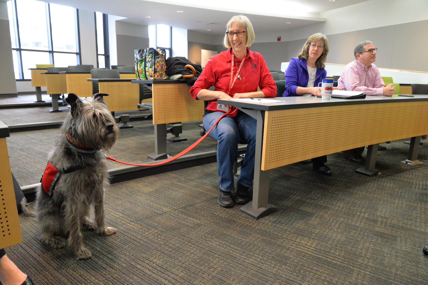 Zeke, along with Jeanne McNeil, Chris Miller and David Sams of Sprite's HERO, listen as VCU students present their pro bono marketing work during CreateAthon. (Photo by Brian McNeill)
