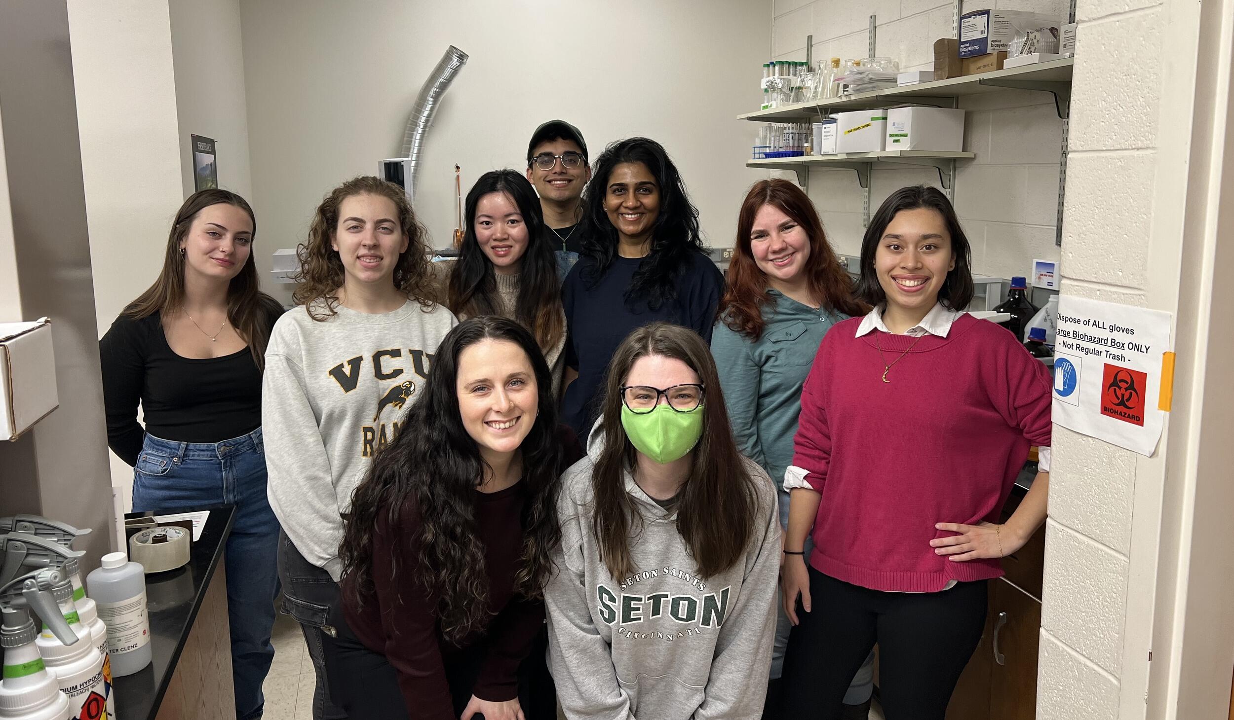 A group phot of nine people. 