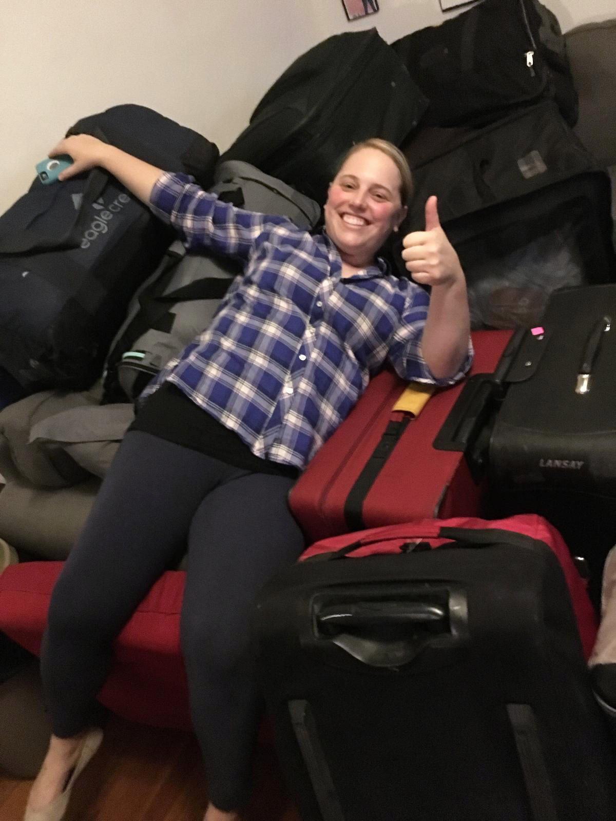 Peron, in high spirits, relaxes after packing donated supplies ahead of the trip.