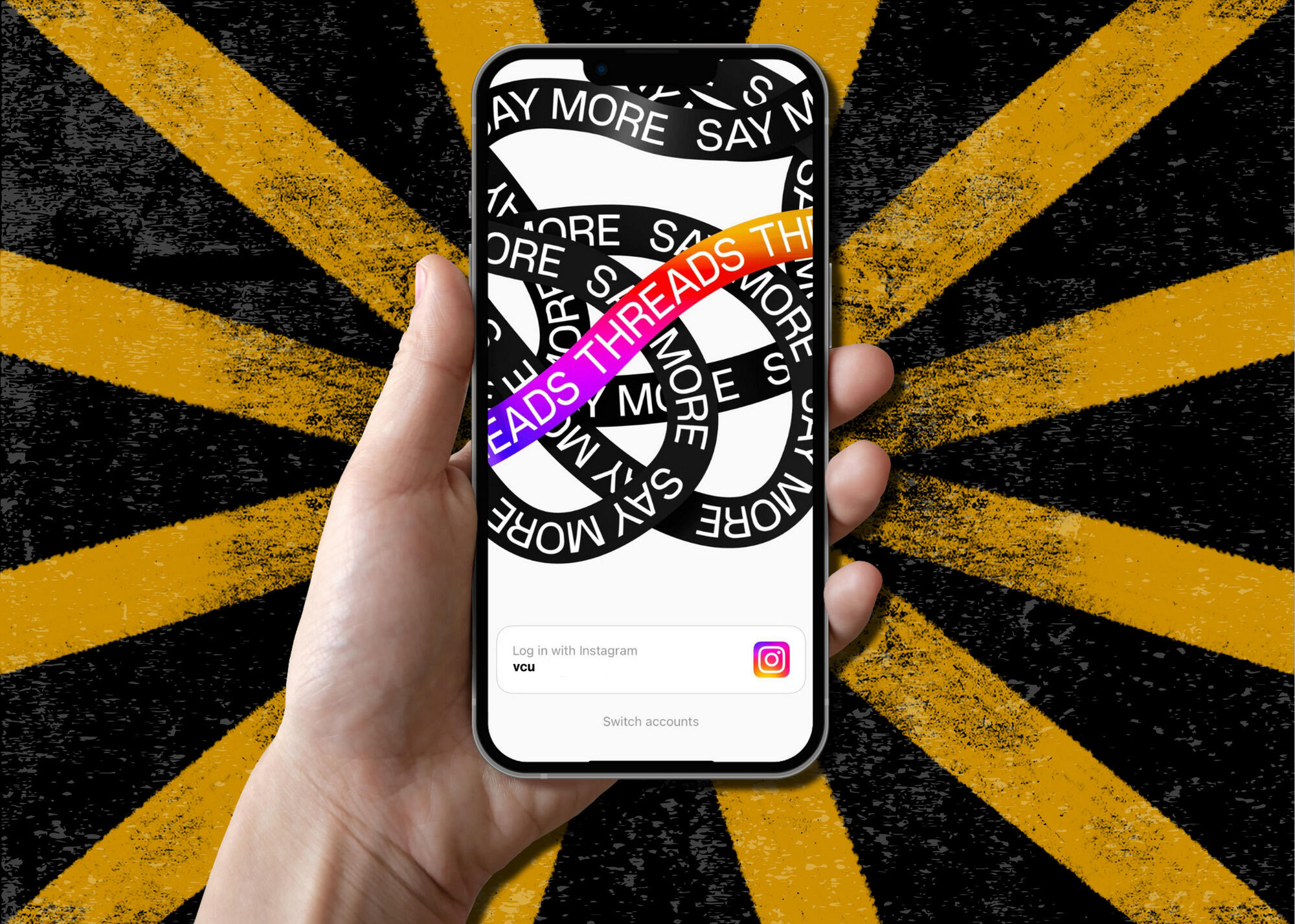 A hand holding an iphone with a graphic that says \"Threads\" in white letters 