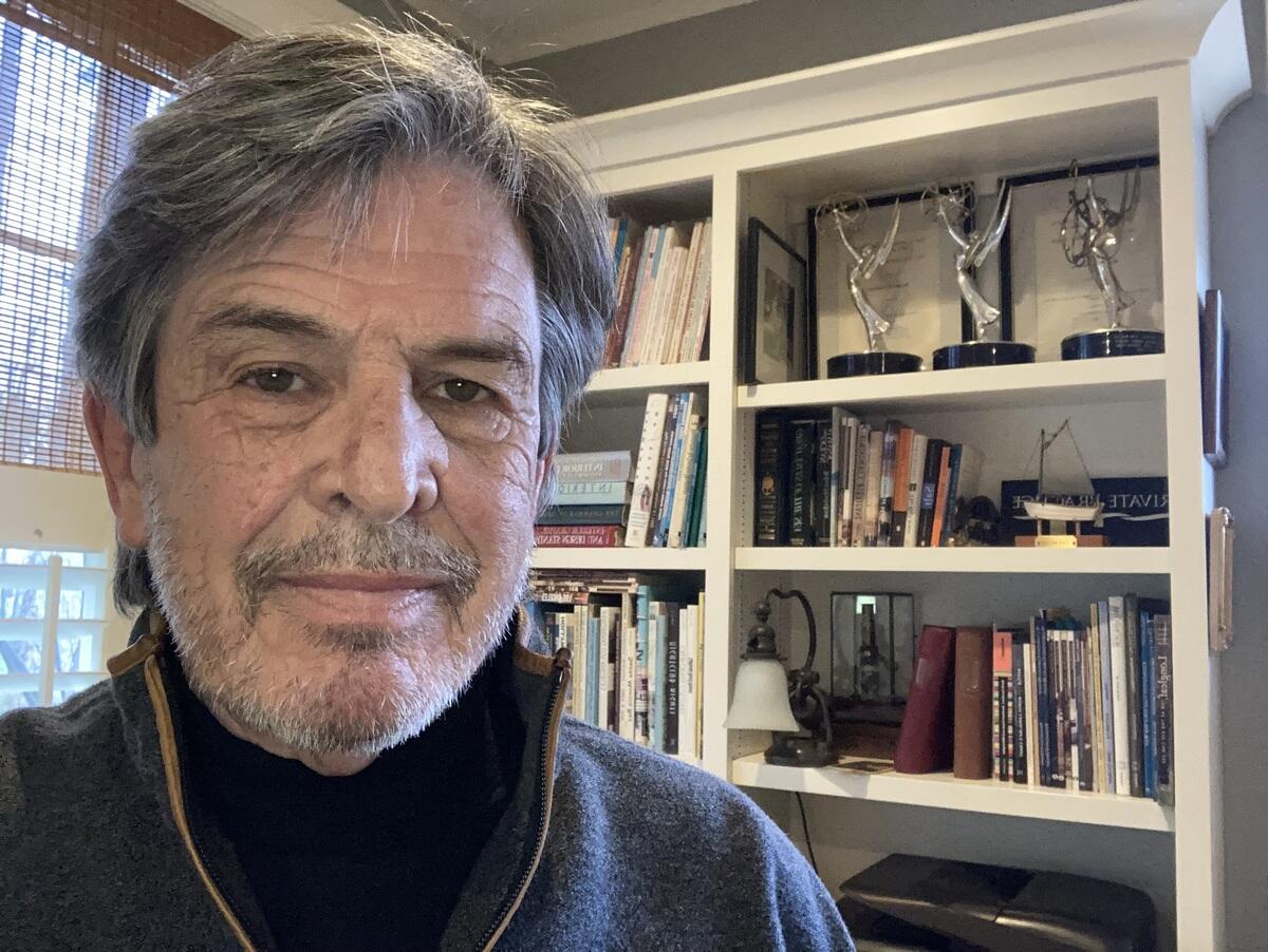 A photo of a man from the shoulders up 