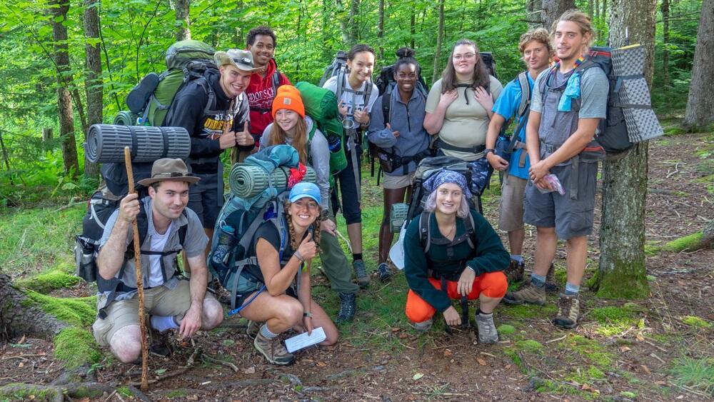 A group of students donning outdoor gear.