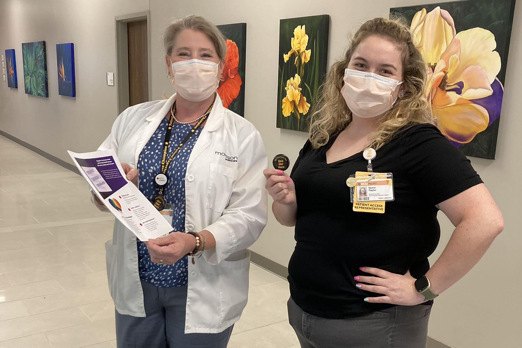 Two medical professionals standing next to each other 