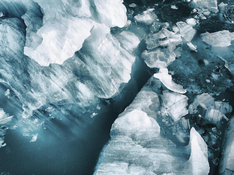 A drone image of icebergs broken off from a glacier at Vatnajökull, Iceland. 