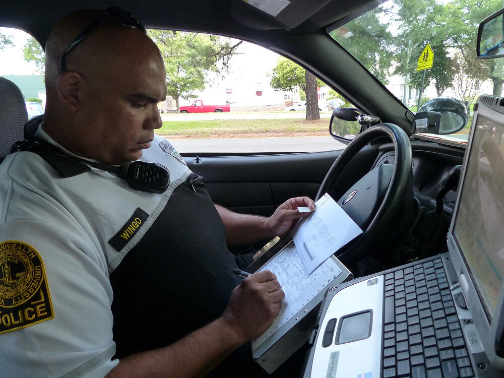 VCU Police Officer Marvin Wingo worked with the Richmond Police Department and Virginia State Police on a red light initiative to help keep pedestrian crossings safer around VCU. (July 2014)