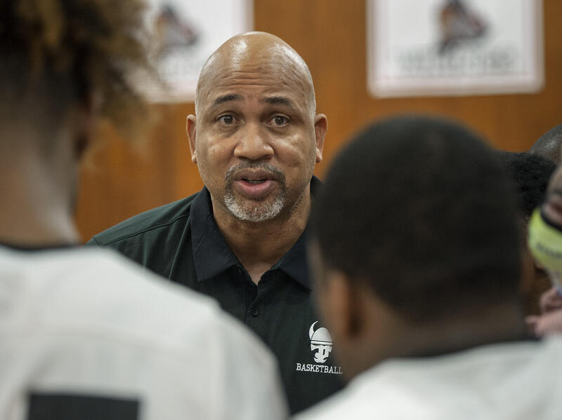 Kendrick Warren speaking to some players