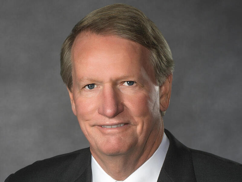 A photo of a man from the shoulders up