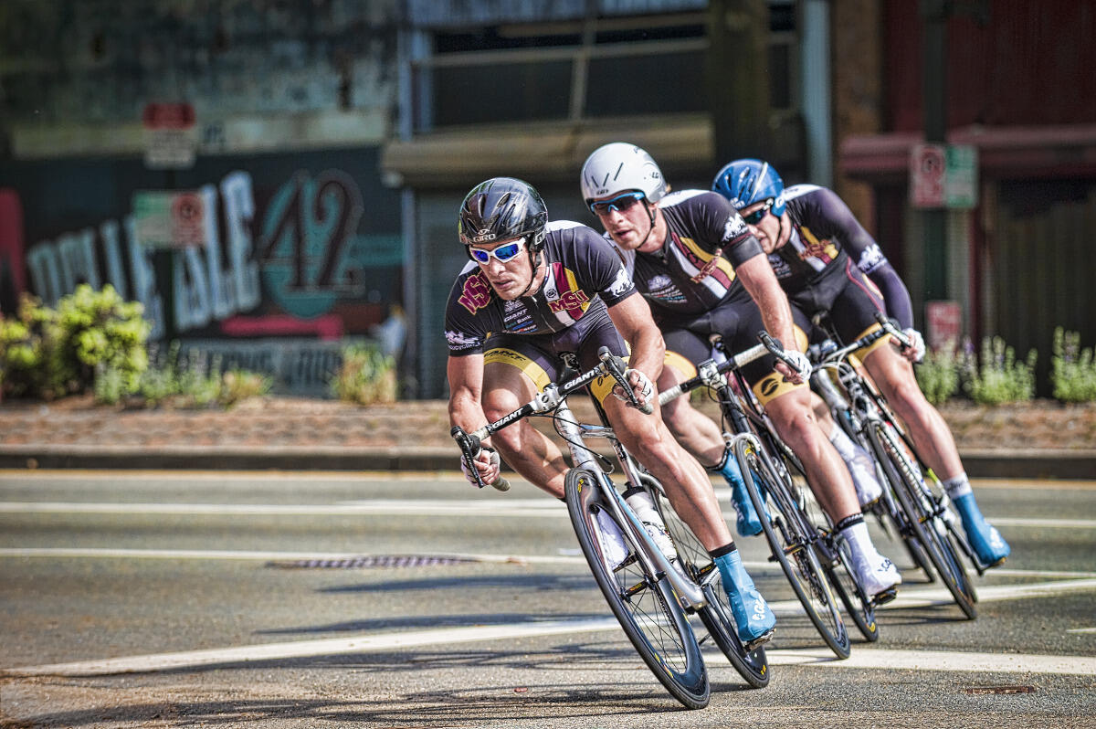 Teammates in the USA Cycling Collegiate Road National Championships demonstrate the technique of drafting during the team time trial event.