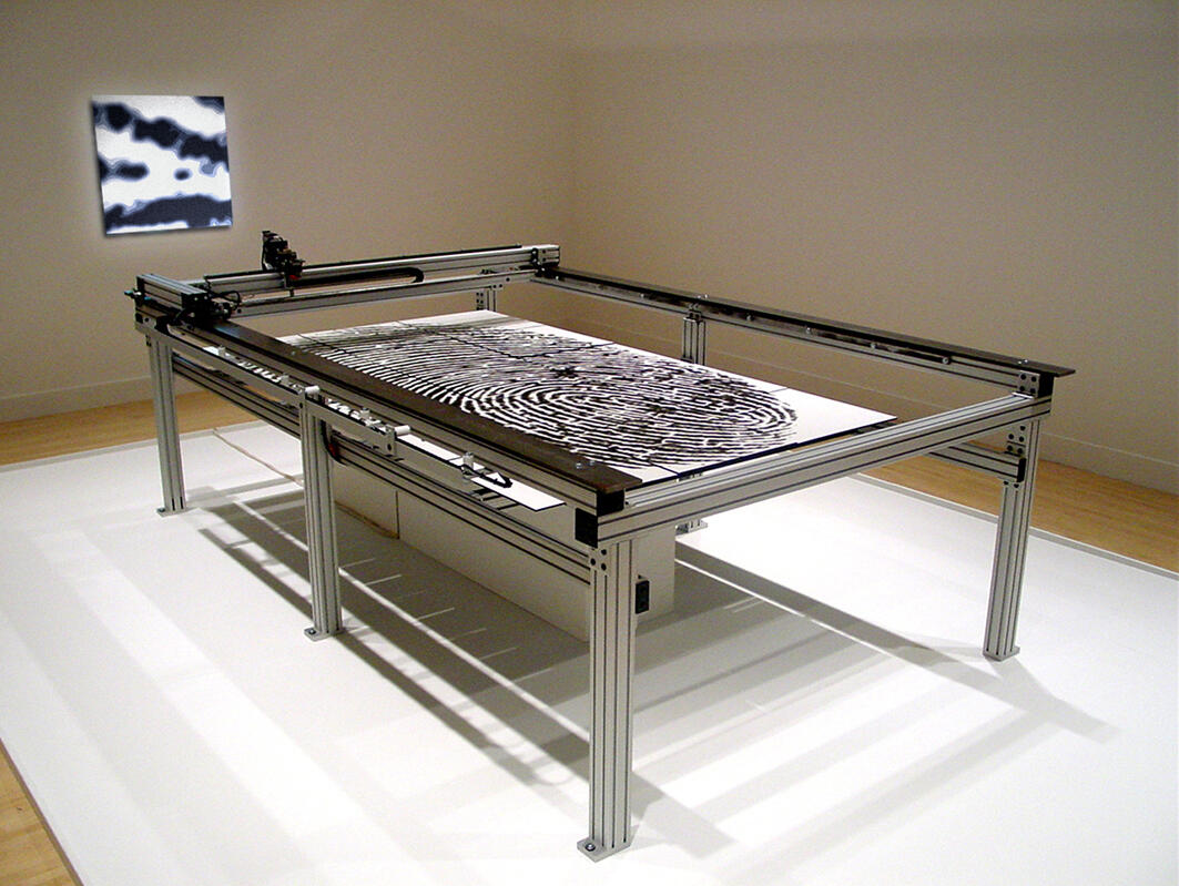 Brixey's "Chimera Obscura" centered on the remote operation of a tele-robot that millions of online visitors piloted through an elaborate real-world maze in a museum created from a human thumbprint. Stored data from visitors’ electronic "bread crumbs" comprising virtual information in the form of text, video and audio evolved into large-scale inhabited nodes that grew and mutated over time. (Photo courtesy of Shawn Brixey)