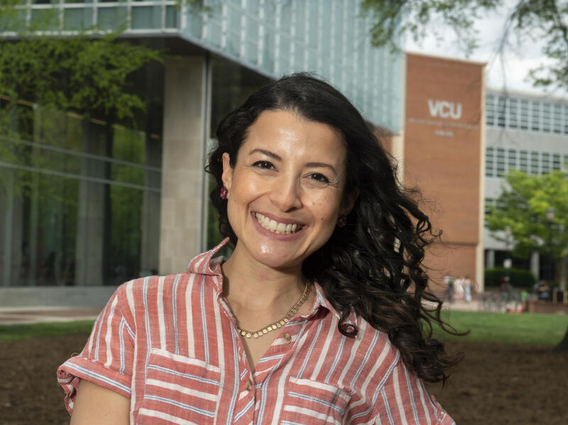 Monica Jimenez Sablich standing in front of James Branch Cabell Library