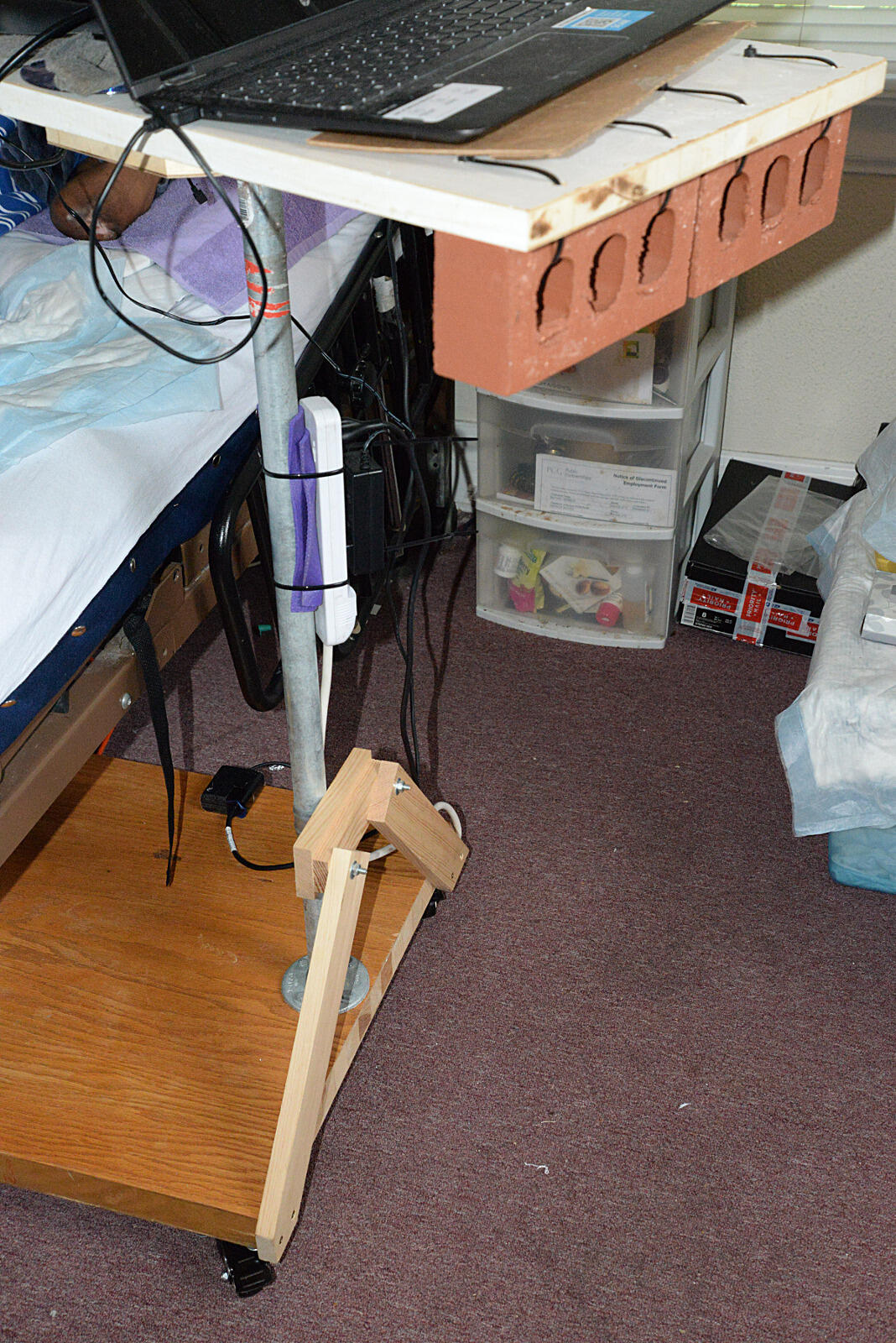 The students constructed Bayard's computer table out of everyday supplies like Lazy Susan hardware and zip ties.
<br>Photo by Leha Byrd, University Public Affairs.