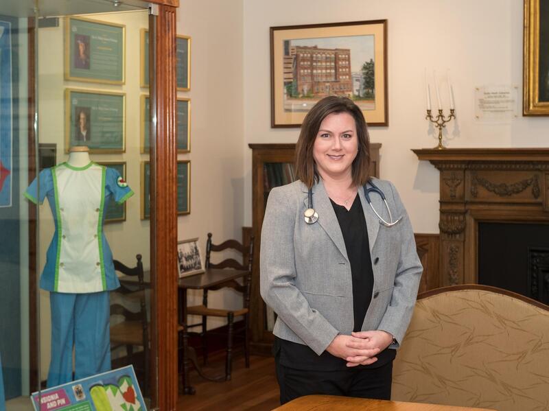 A woman wearing a sportscoat with a stethoscope around her neck