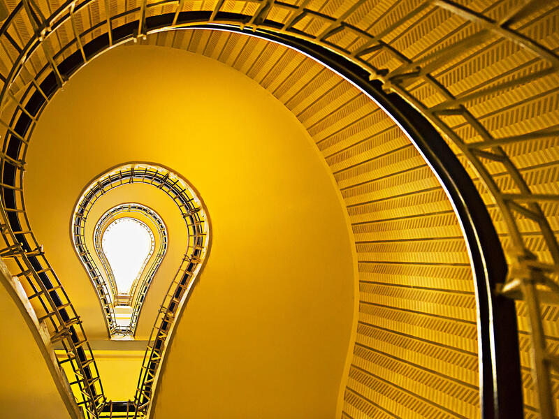 A spiral staircase in the shape of a lightbulb. 