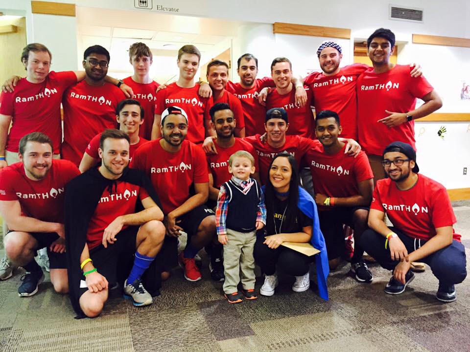 RamTHON participants pose for a photo with Blake Hassmer, one of the Children's Hospital of Richmond patients who visited the event.