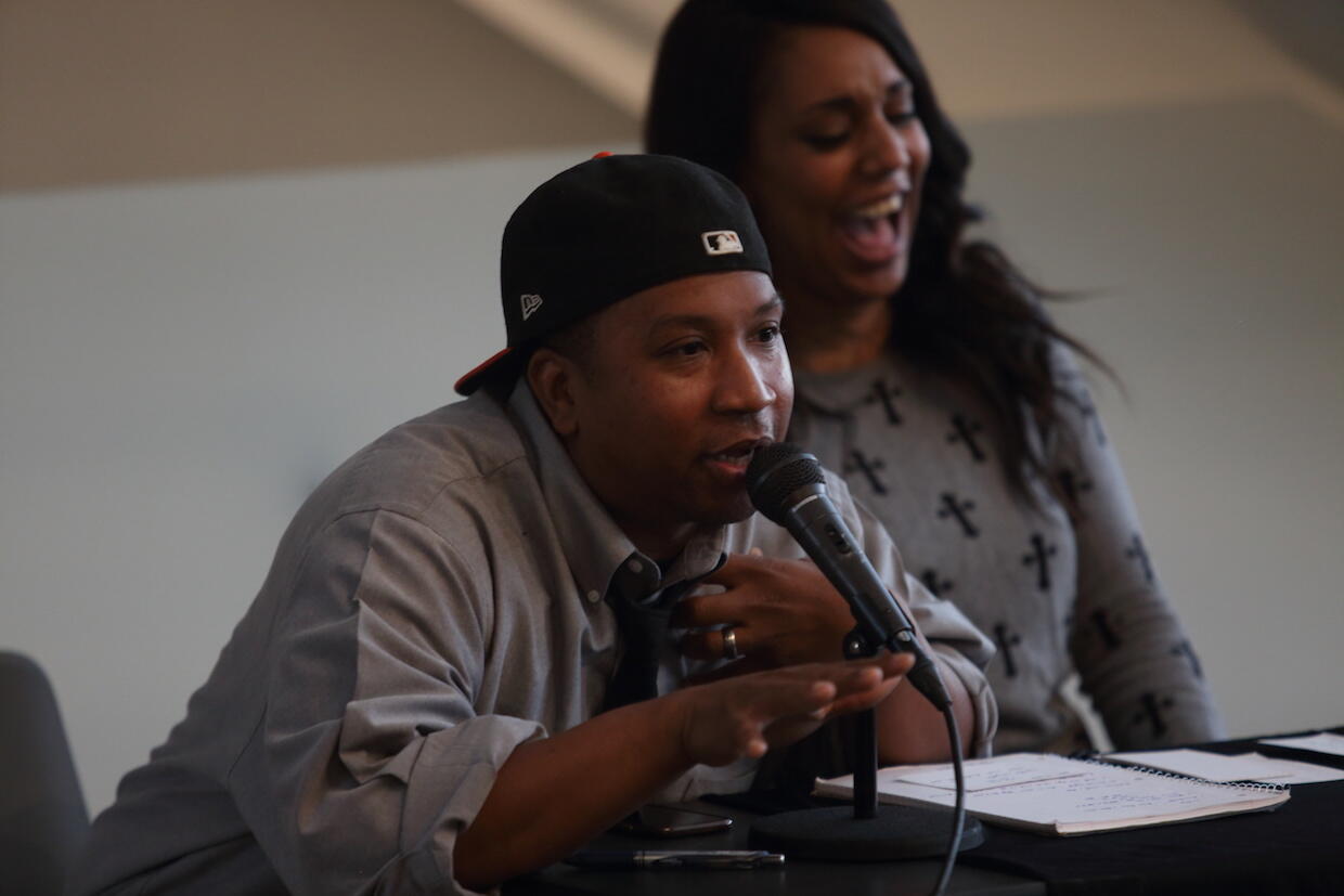 Marc Cheatham at the microphone, hosting a radio show.