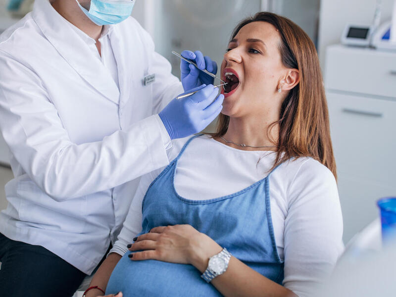 pregnant woman at the dentist