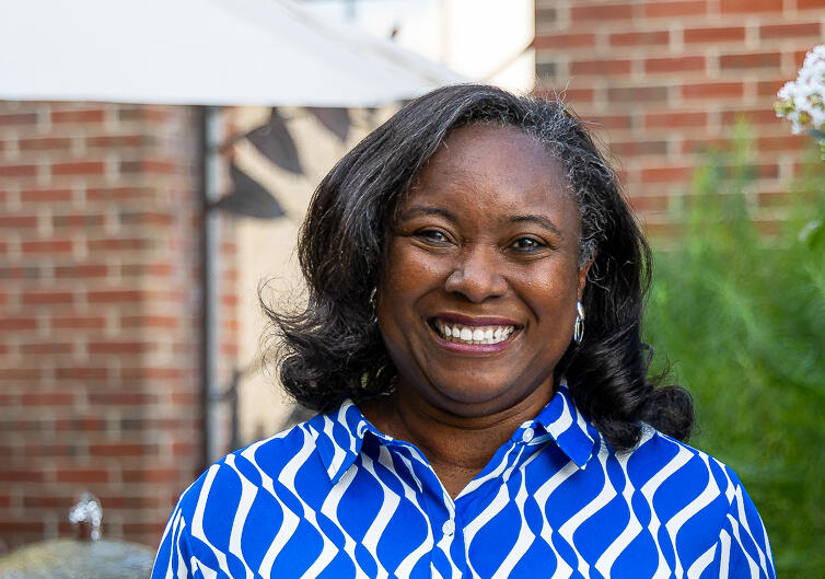 A photo of a woman from the shoulders up