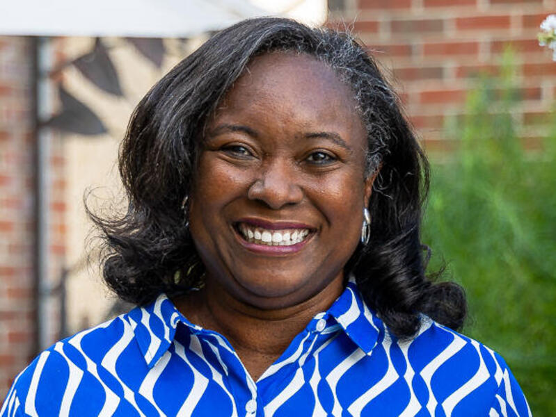 A photo of a woman from the shoulders up