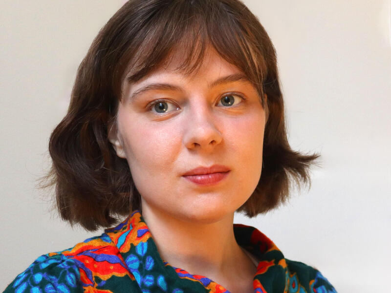 Head and shoulders image of a woman.