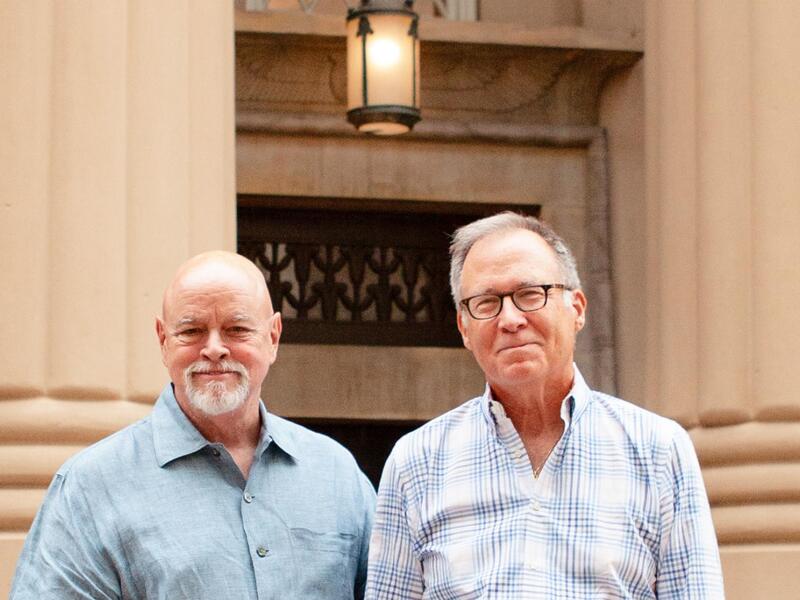 A photo of two men from the waist up 