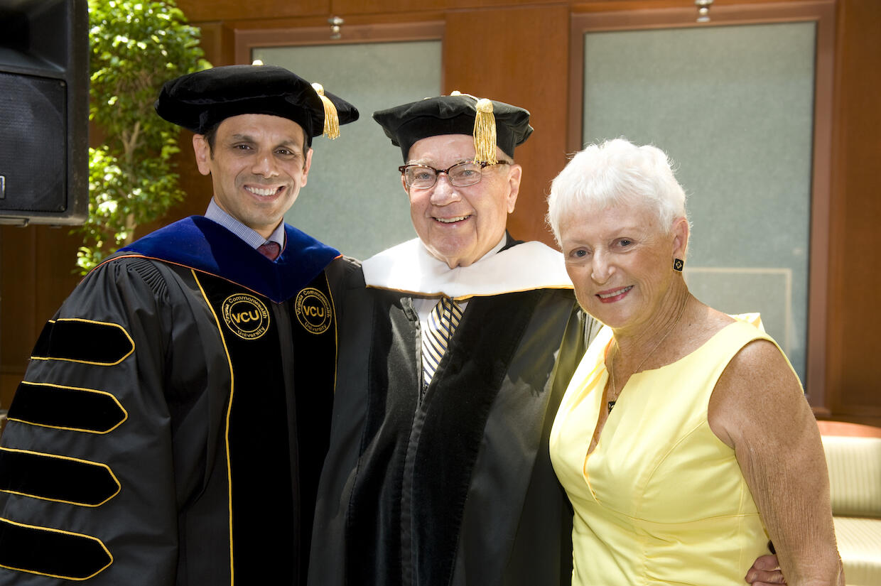 Kenneth Wright, center, joined by his wife, Dianne, and VCU President Michael Rao in 2011.
