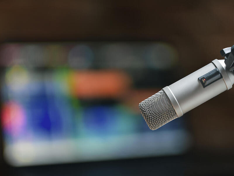 A microphone in a studio setting.