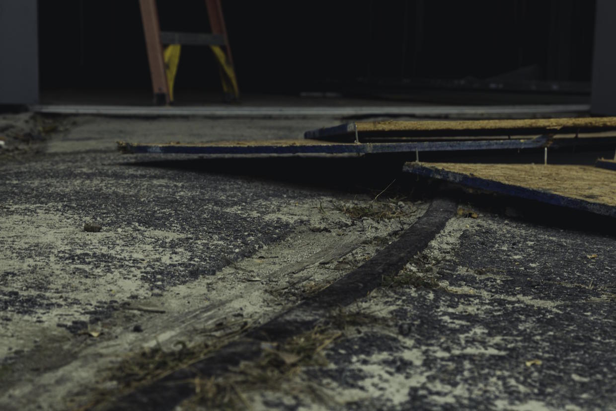 Trolley tracks from the alley to the back of the current building’s interior are still visible.