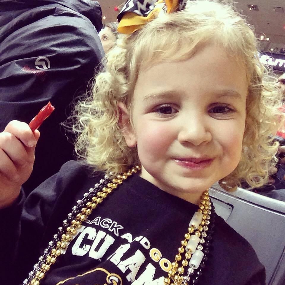 Audrey Costa, a big fan of Rodney the Ram, attends a VCU basketball game.