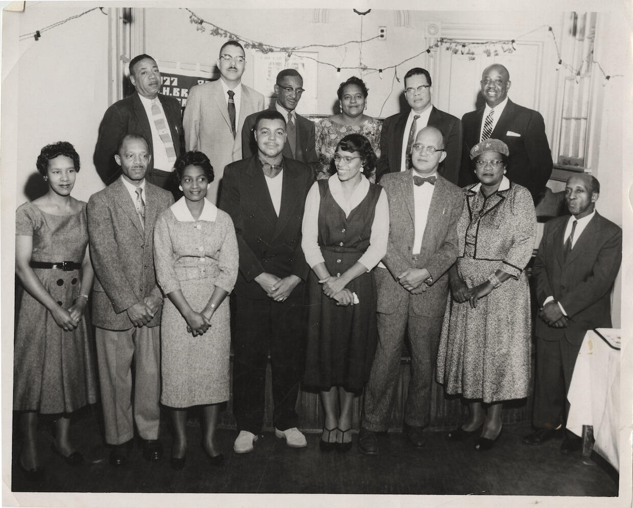 The three co-founders of the Richmond Crusade for Voters pictured with a group outside the city of Richmond who wanted to learn more about the organization. Back row second from the left is William Ferguson Reid, M.D., and second from the right is William S. Thornton, D.P.M. On the first row, third from the right, is John Mitchell Brooks.
<br>Courtesy of Special Collections and Archives, James Branch Cabell Library, VCU Libraries.