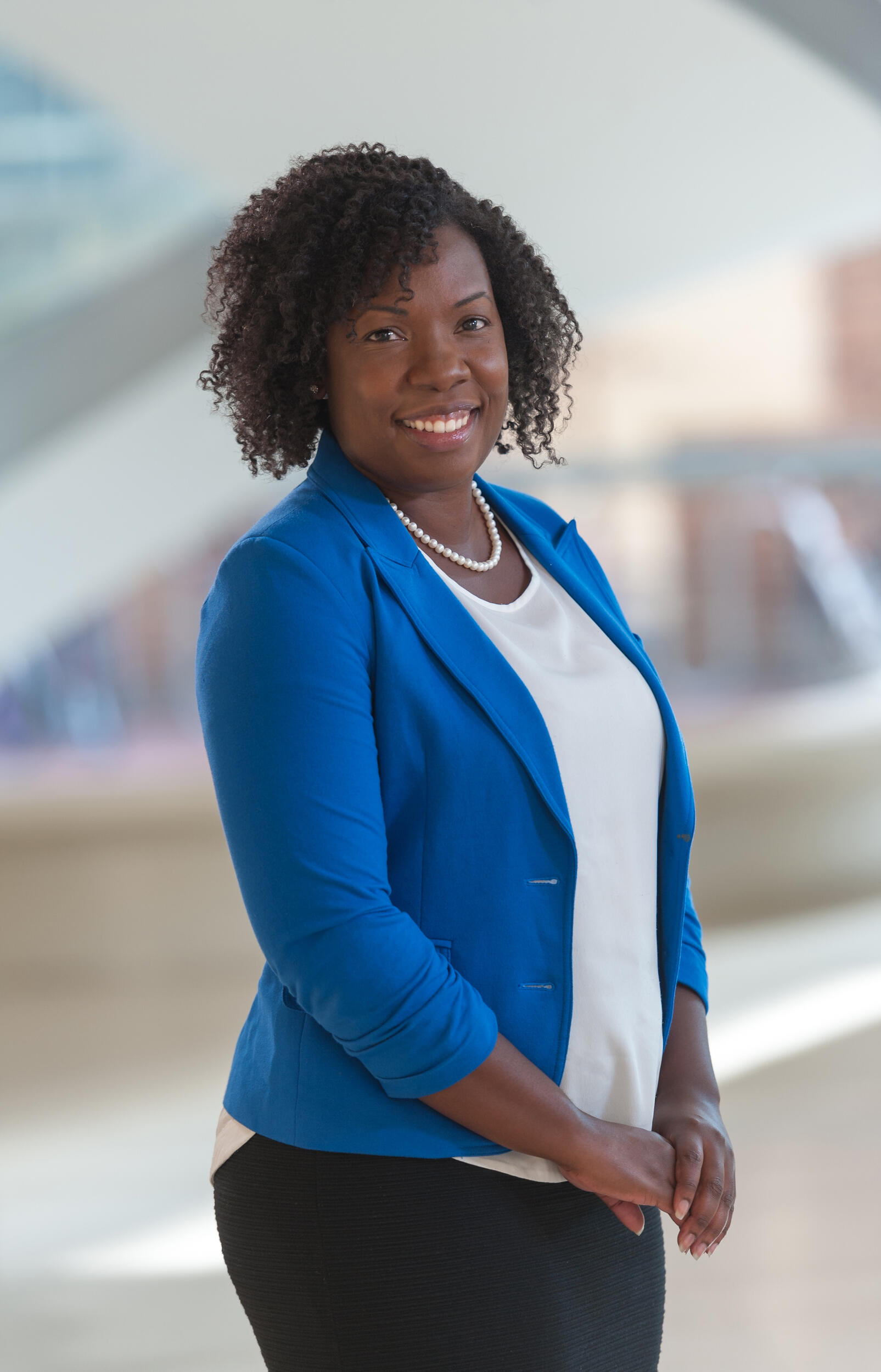 A portrait of a woman standing 