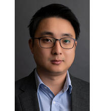 A photo of a man from the shoulders up