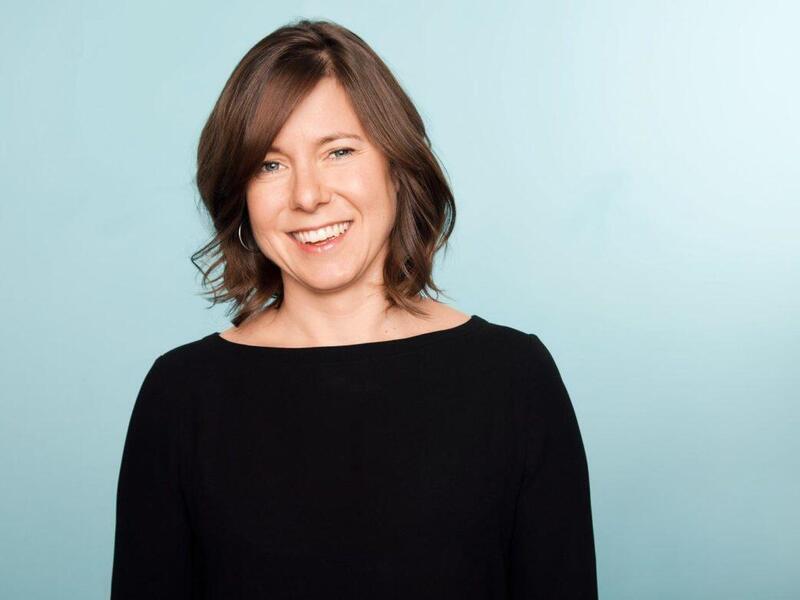 A photo of Anna Sale smiling 