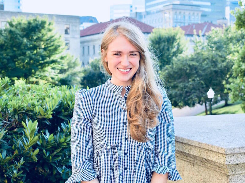 VCU student Brooke Danielsson standing at the Virginia State Capitol.