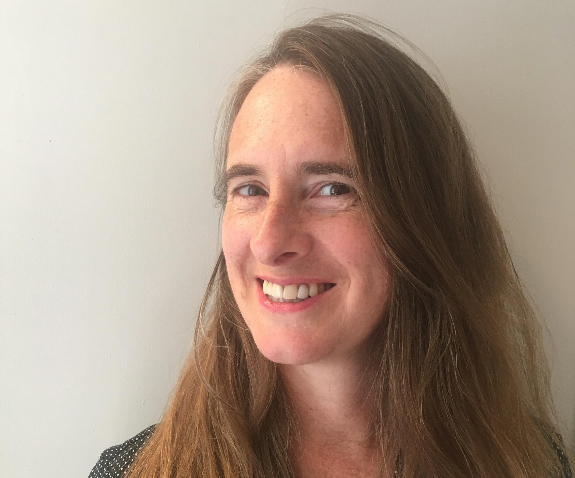 A portrait of a woman smiling 